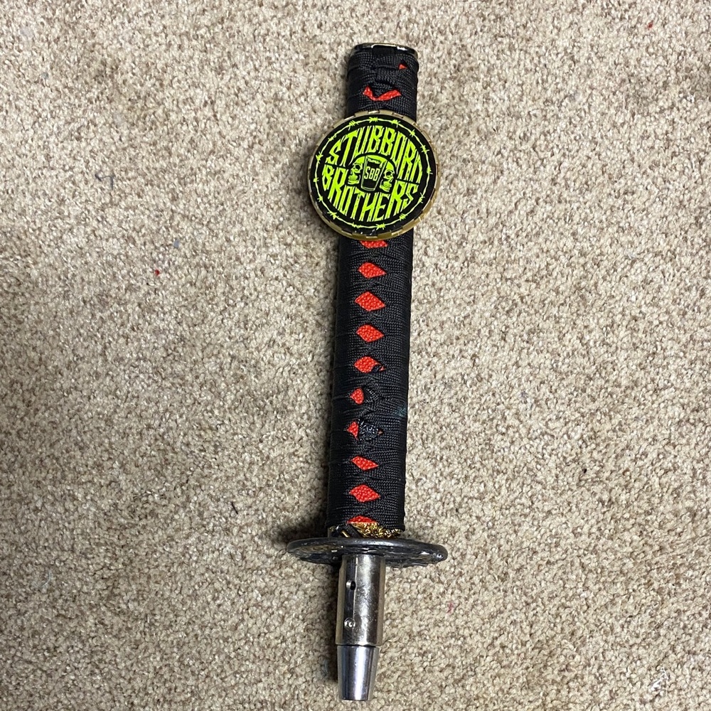 Black and Red Sword Handle with Stubborn Brothers Patch
